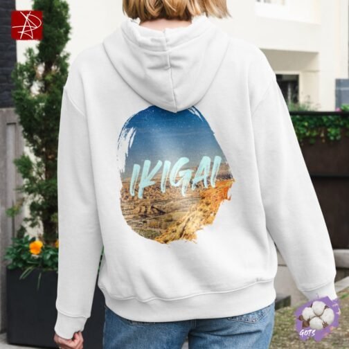 Unisex organic cotton hoodie with “Ikigai” desert landscape design and front pouch pocket – sustainable, GOTS certified, and eco-friendly fashion.