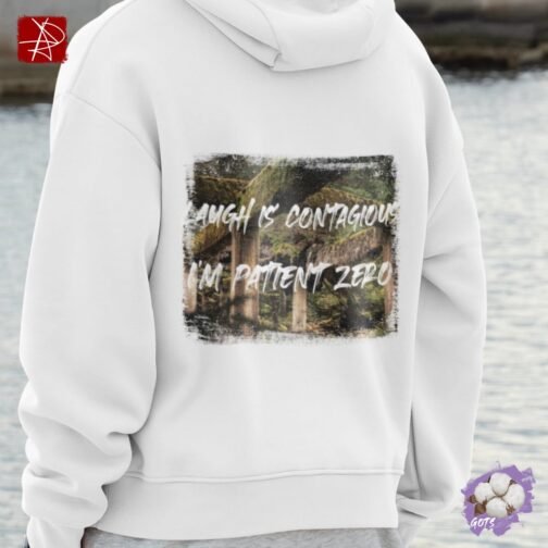 Spread joy with our organic cotton hoodie featuring the “Laughter is Contagious” quote and forest design. GOTS certified and eco-friendly, perfect for sustainable fashion lovers.